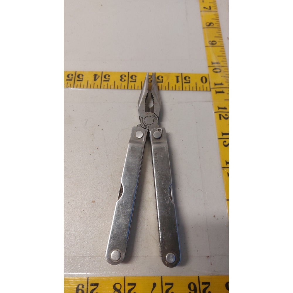 Leatherman PST. Used, retired, very good Big Letter